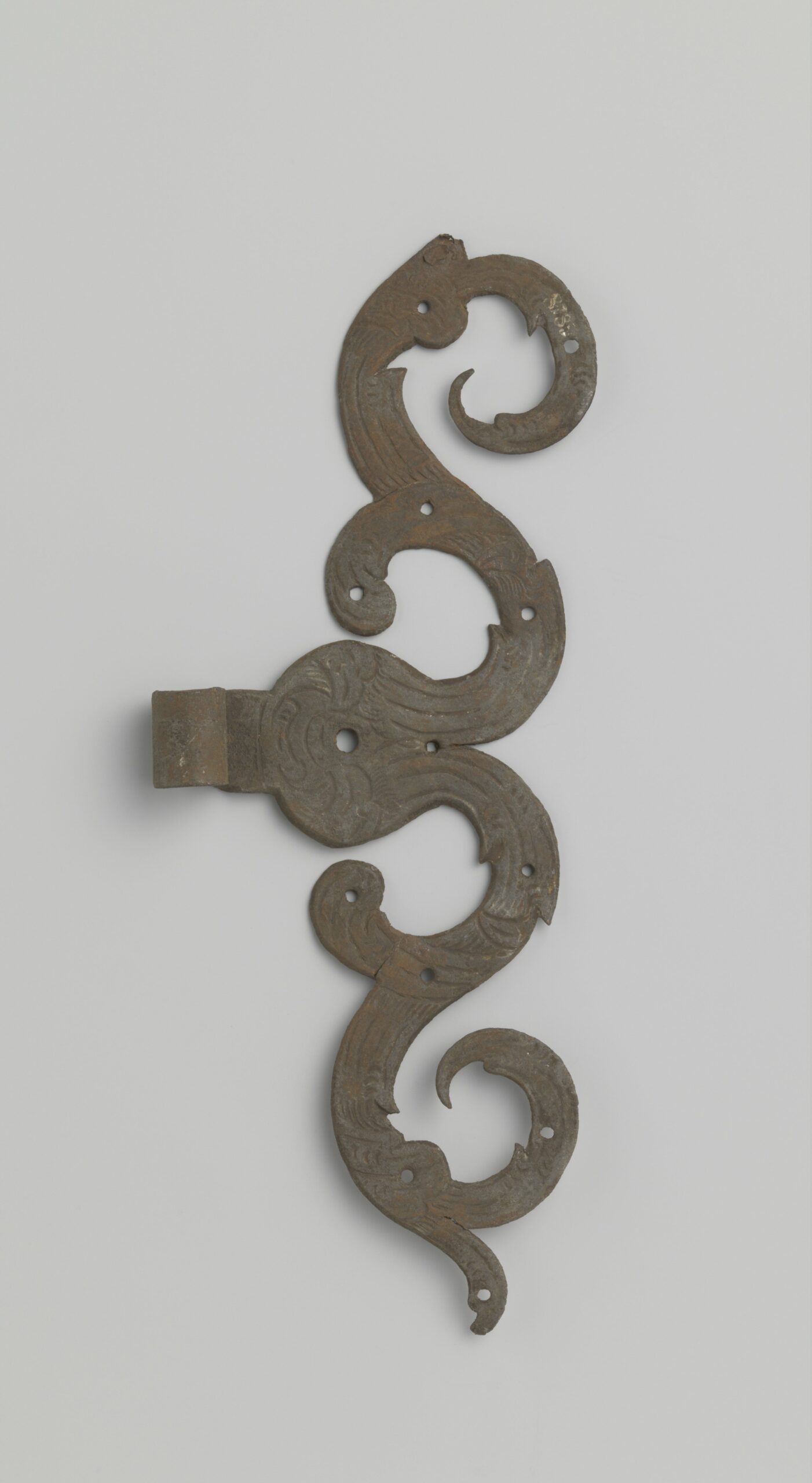 Historic metal door hinge from the Rijksmuseum collection showing traditional form and construction